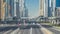 Busy Sheikh Zayed Road , metro railway and modern skyscrapers around in luxury Dubai city