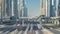 Busy Sheikh Zayed Road timelapse, metro railway and modern skyscrapers around in luxury Dubai city