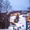 Busy ski resort with open evening runs