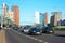 Busy street with modern steel and glass skyscrapers Vilnius