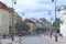 Busy street with pedestrians and cyclists in Warsaw. Beautiful urban panorama