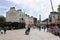 Busy street with shops and pubs in Greenwich, London.