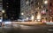 Busy traffic night scene in Manhattan, 5th Avenue with 54th Street