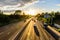 Busy traffic on uk motorway road overhead view at sunset