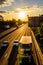 Busy traffic on uk motorway road overhead view at sunset