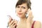 Busy unhappy beautiful woman with two cellphones