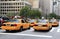 Busy yellow taxis in traffic, New York City