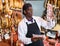 Butcher checking quality of jamon