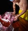 Butcher cutting pork meat on kitchen, chef cutting fresh raw meat on table