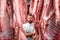 Butcher at the meat manufacturing