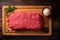 Butchers artistry top view of fresh minced beef on wood