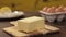 Butter - Block of Butter On A Table - Front Angle - Tilt - Top To Bottom