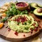 Butter board with avocado dip butter with pomegranate seeds, parsley and lime. Starter for party, finger food. Trendy food concept