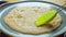 Butter brush smear pancake on hot pan gas stove in kitchen. Slowmo closeup