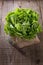 Butter lettuce on a burlap cloth over rustic background