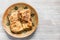 Butter Naan on brass plate on gray wooden table