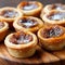 Butter Tarts: Sweet Pastry with Buttery Syrup Filling and Raisins or Nuts