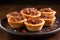 Butter Tarts: Sweet Pastry with Buttery Syrup Filling and Raisins or Nuts