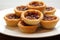 Butter Tarts: Sweet Pastry with Buttery Syrup Filling and Raisins or Nuts