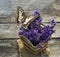 Butterfly on Fresh lavender flower on wooden table. Summer flower background