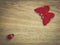 Butterfly and ladybug decoration on a wooden background.