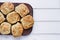 Buttermilk Southern Biscuits on Cutting Board Over White Table