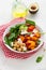Butternut pumpkin salad with feta and roasted chickpea healthy food bowl avocado