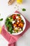 Butternut pumpkin salad with feta and roasted chickpea healthy food on light surface