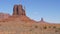 Buttes of red orange sandstone rock formations in monument Valley Usa