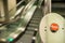 Button of stop escalator on the right at the bottom of the stairs without focus