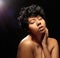 Buxom Black woman nude studio shots