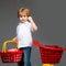Buy with discount. Family shopping. Buy products. Play shop. Cute buyer customer client hold shopping cart. Kids store