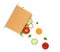 Buy more vegetables idea, veg day concept, eco vegetables concept, vegetables falling from paper bag on white background