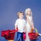 Buy products. Play shop game. Cute buyer customer client hold shopping cart. Girl and boy children shopping. Couple kids