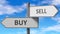 Buy and sell as a choice - pictured as words Buy, sell on road signs to show that when a person makes decision he can choose