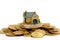 Buy your Dream House concept with Golden Coins stack