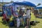 Buyer And Purchaser Of Clothes At Country Stall