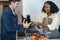 Buyer shopping vegetable togather  on shelf in freezer in convenience store