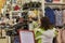 Buyers measure clothes in the supermarket