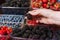 Buying berries in the local market