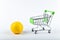 buying lemons. trading concept. Online shopping concept. Cart and lemons over a white background. business concept. Healthy eating