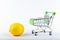 Buying lemons. trading concept. Online shopping concept. Cart and lemons over a white background. business concept. Healthy eating