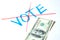 Buying votes of voters concept. Vote, dollars on a white background