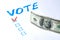 Buying votes of voters concept. Vote, dollars on a white background