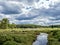 Buzzardâ€™s Swamp in Marienville, Pennsylvania, near Cooks Forest and Clarion, in the summer with a dirt road path leading into th