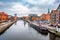 BYDGOSZCZ, POLAND, NOVEMBER 25, 2018: Embankment of the Polish city of Bydgoszcz in autumn, statue