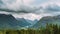 Byrkjelo Village, Sogn Og Fjordane County, Norway. Beautiful Sky Above Norwegian Rural Landscape. Bergheimsvatnet Lake