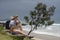 Byron Bay Main Beach Caucasian Tourist Serene Thinking and Admiring the View, New South Wales Australia.