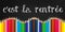 C`est la rentree meaning Back to school written on a black board background with a wave of colorful wooden pencils