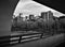 C-Train Bridge Pedestrian Pathway and the downtown highrises in Calgary, Alberta, Canada.